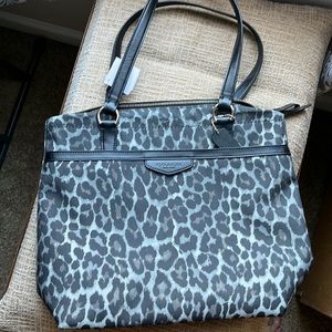 NWT authentic Coach ocelot print purse. Purchased from a Coach store.